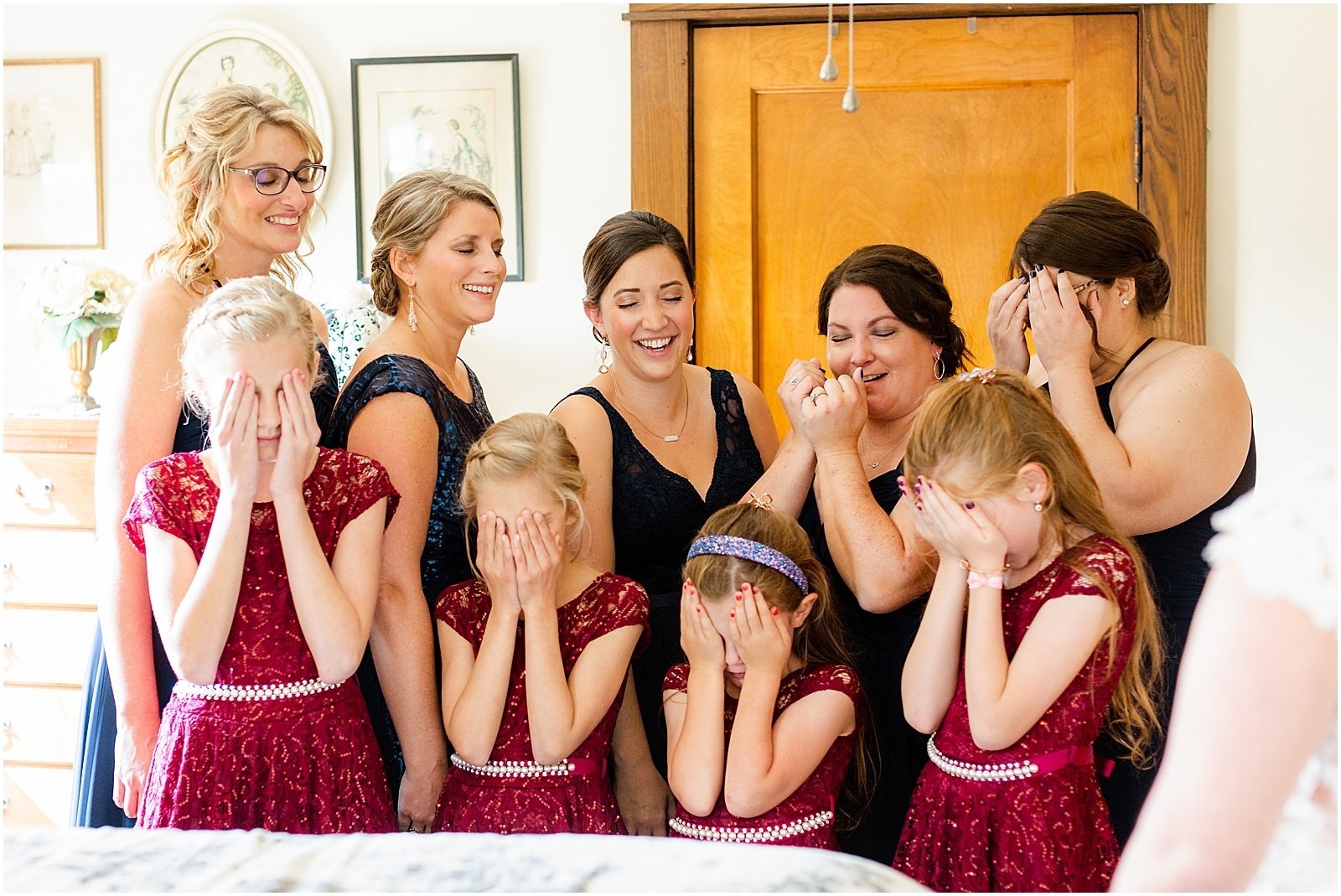 bridesmaids closing eyes before seeing bride