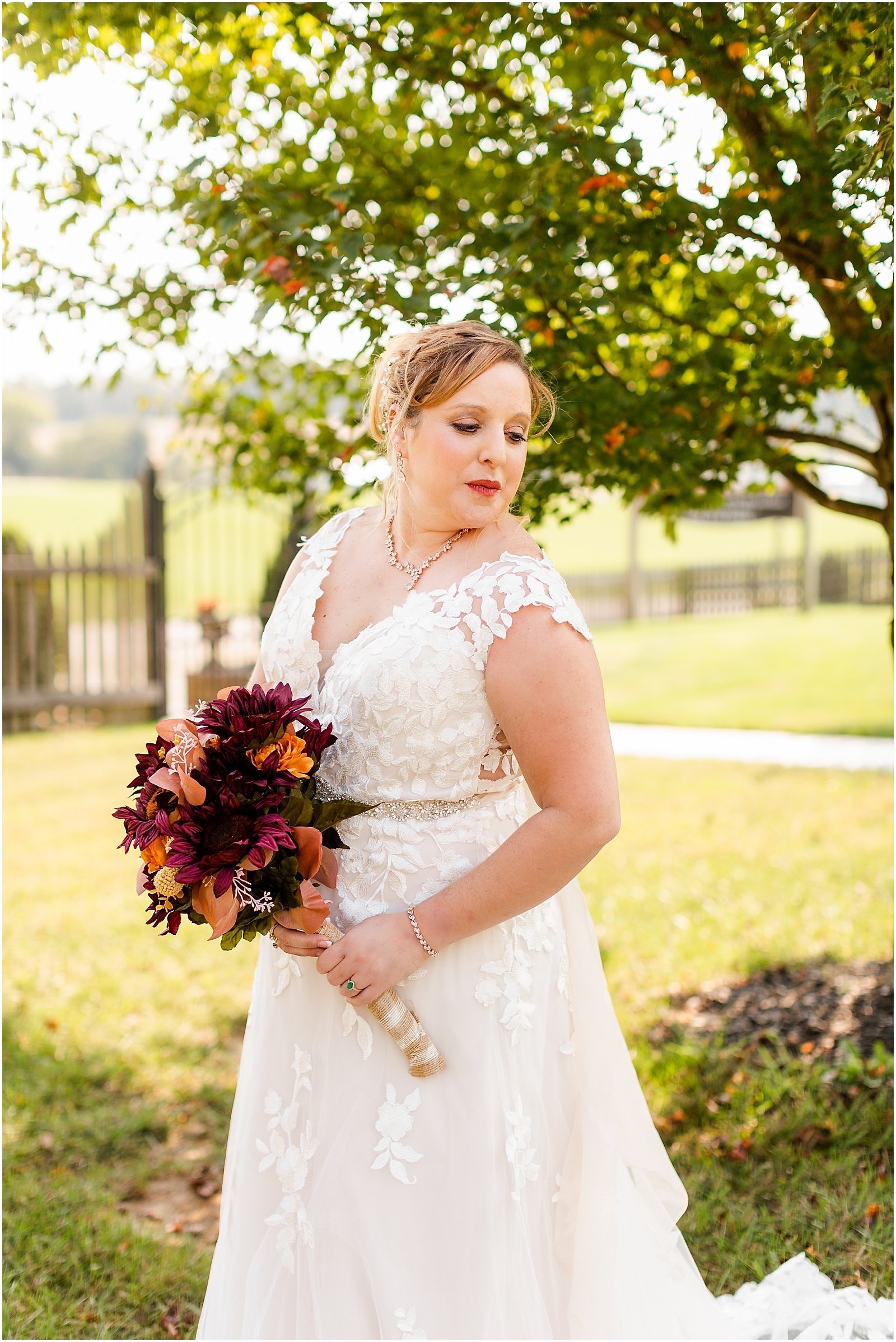 bride holding fall bridal bouquet