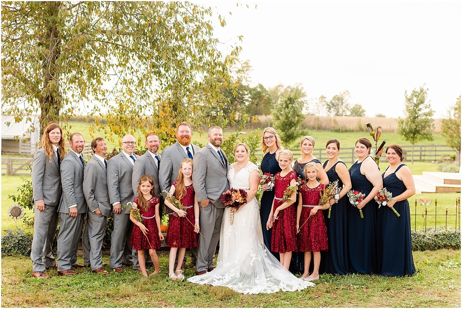 bride and groom with wedding party
